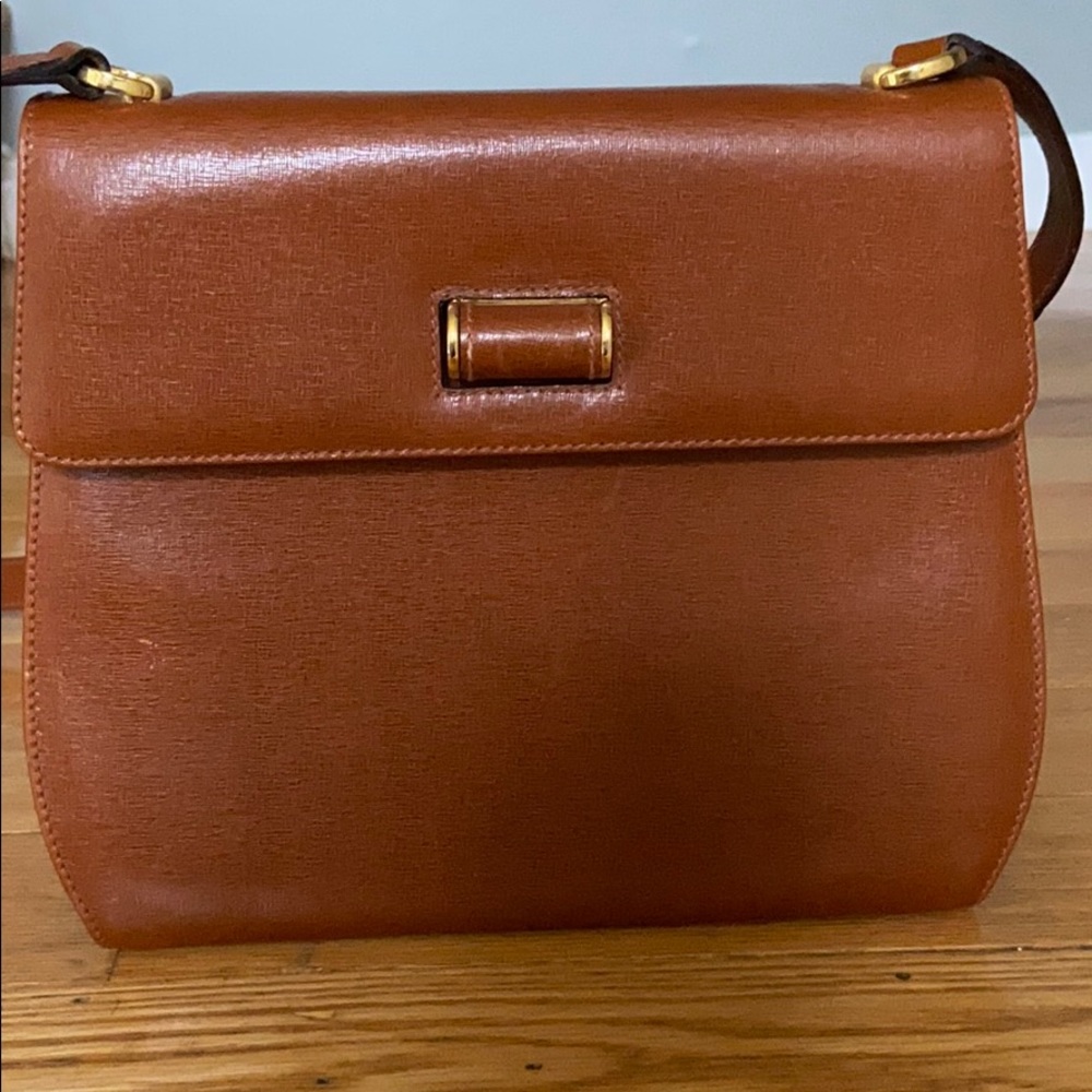 👜